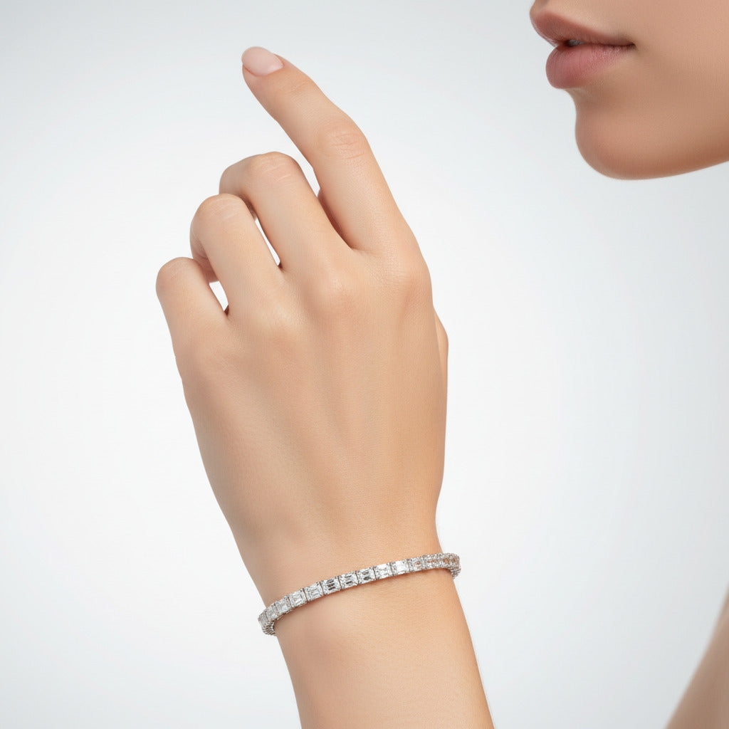 Diamond emerald cut tennis bracelet with white gold